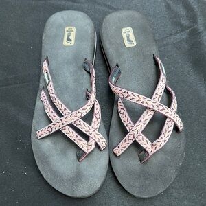 Teva Pink and Black Sandals with Cross-Strap Design